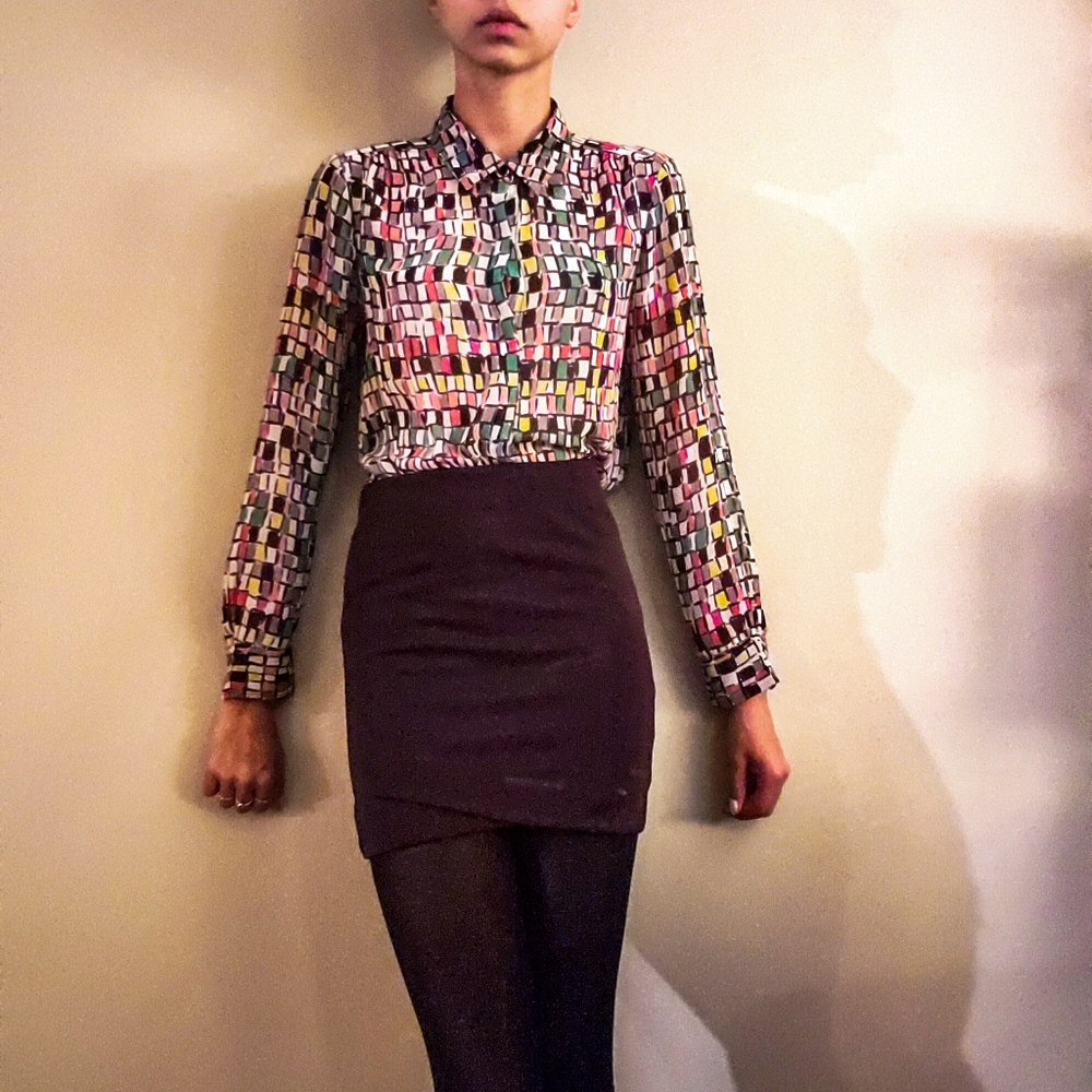 Buttoned shirt.